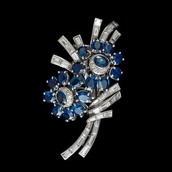 925. A sapphire and diamond brooch, circa 1950. Can also be worn as a pendant.
