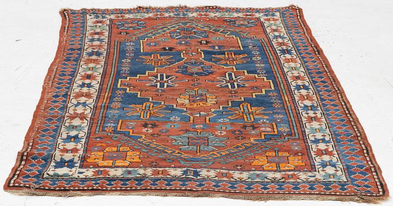 An antique Kazak rug, southern Caucasus, c 168 x 103 cm.
