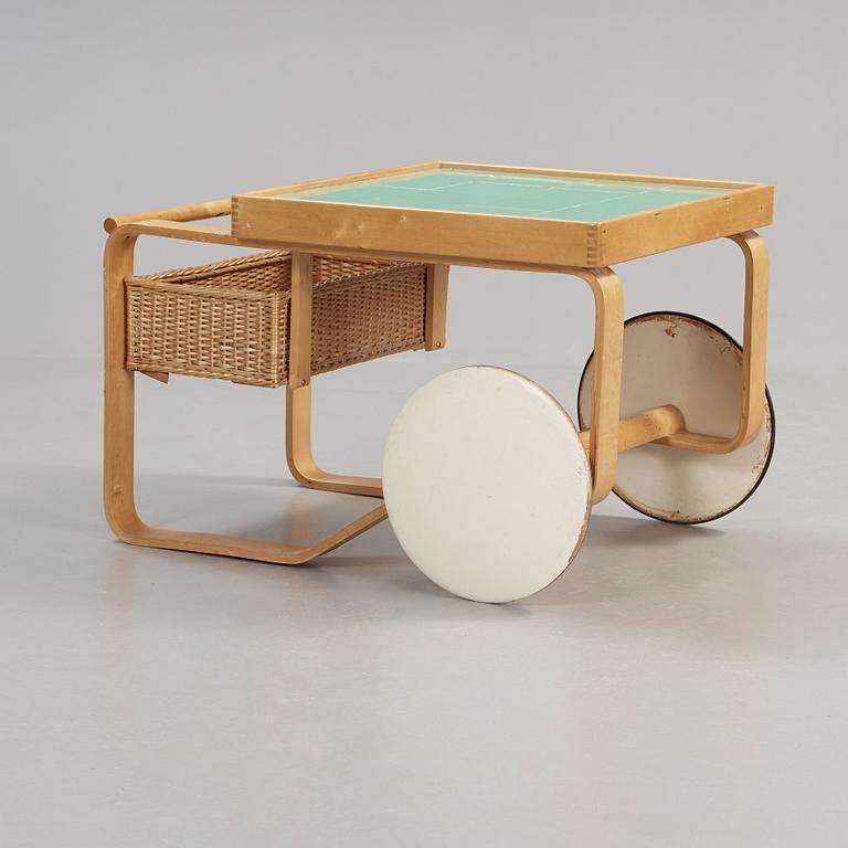 An Alvar Aalto birch serving trolley, made on license by Aalto design Hedemora on behalf of Artek, Sweden 1946-56.