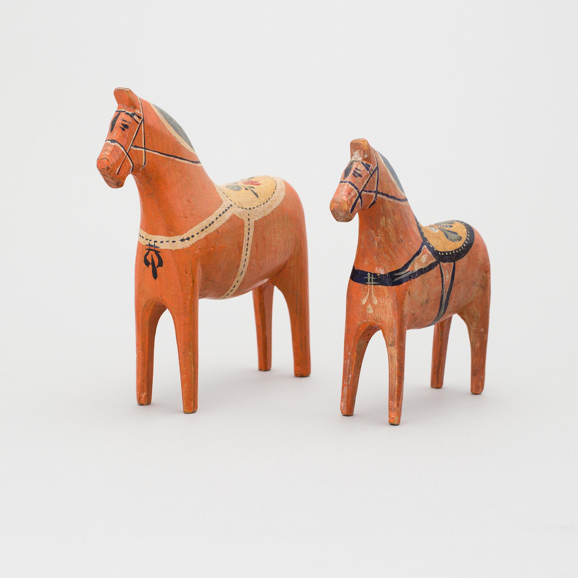 Two painted folk art dala horses first half of the 20th century.