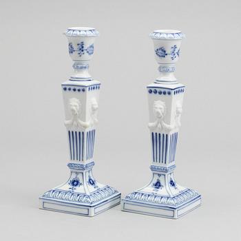 A PAIR OF ROYAL COPENHAGEN PORCELAIN CANDLE STICKS.