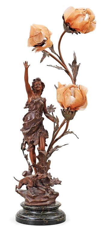 An Art Noveau zink table lamp, ca 1900.