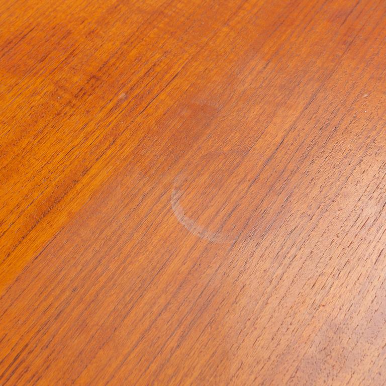 A teak veneer and stained beech dining table, mid 20th Century.