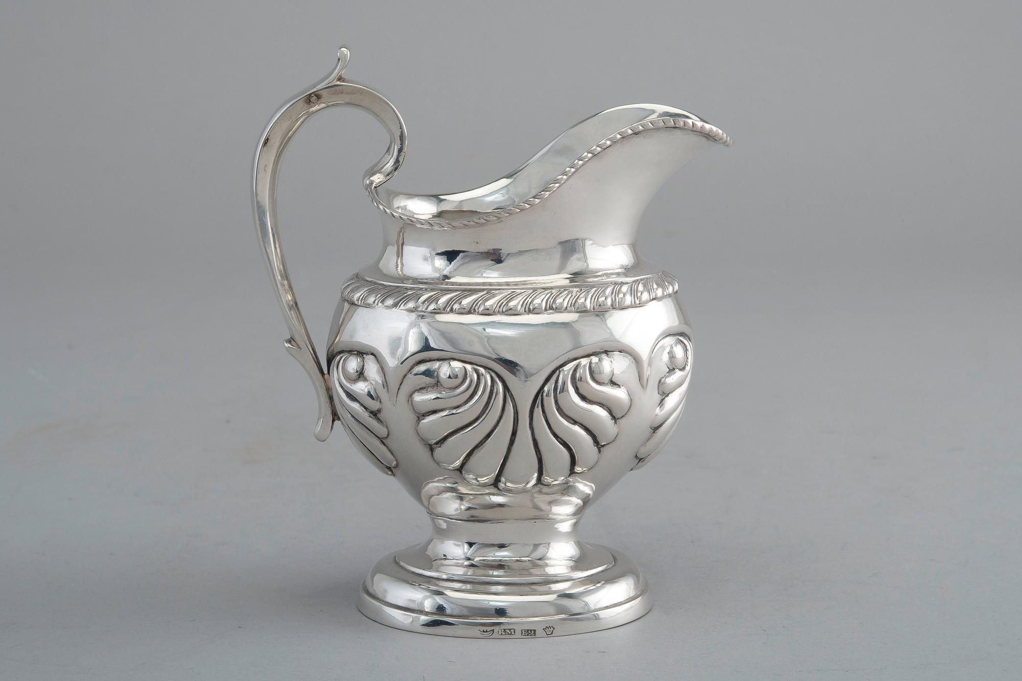 A CREAMER, silver. Roland Mellin Helsinki 1838. Height 12 cm, weight 132 g.