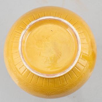 Two Chinese yellow glazed ceramic vases, 20th century.