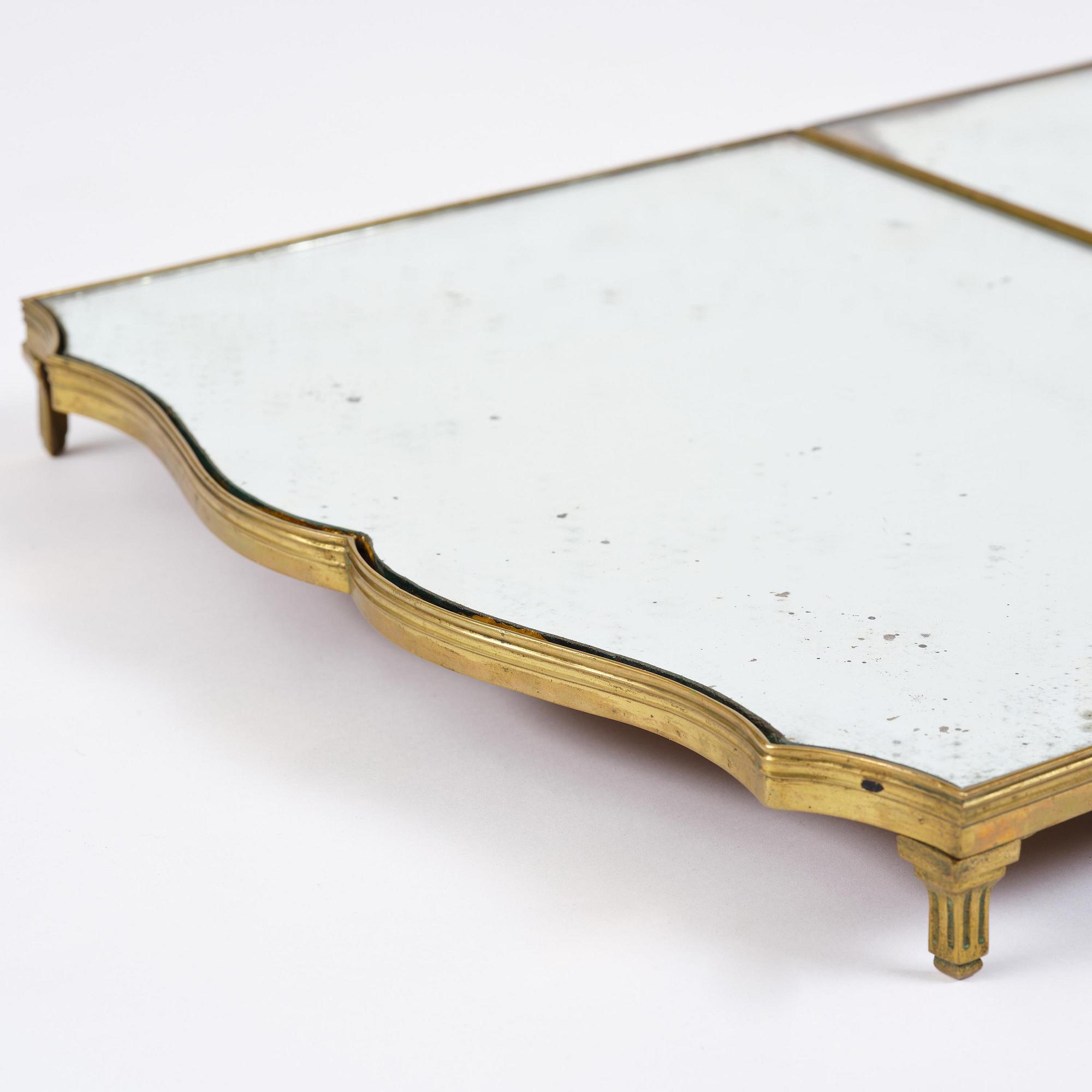 A Gustavian three-piece brass and glass surtout de table, Stockholm, later part 18th century.