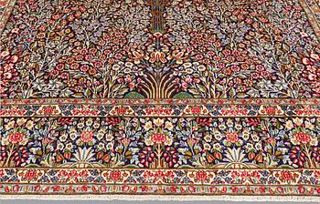 A Kerman Laver carpet, 'Millefleur', approx. 406 x 295 cm.