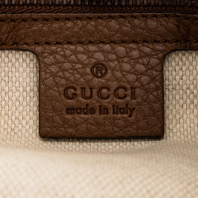 Gucci, a 'Denim Soho Chain Tote' bag.