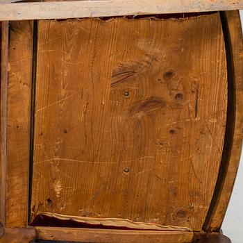 A 19th century swan arm rocking chair.