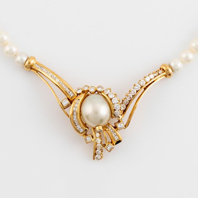 Pearl and baguette- and brilliant cut diamond necklace.