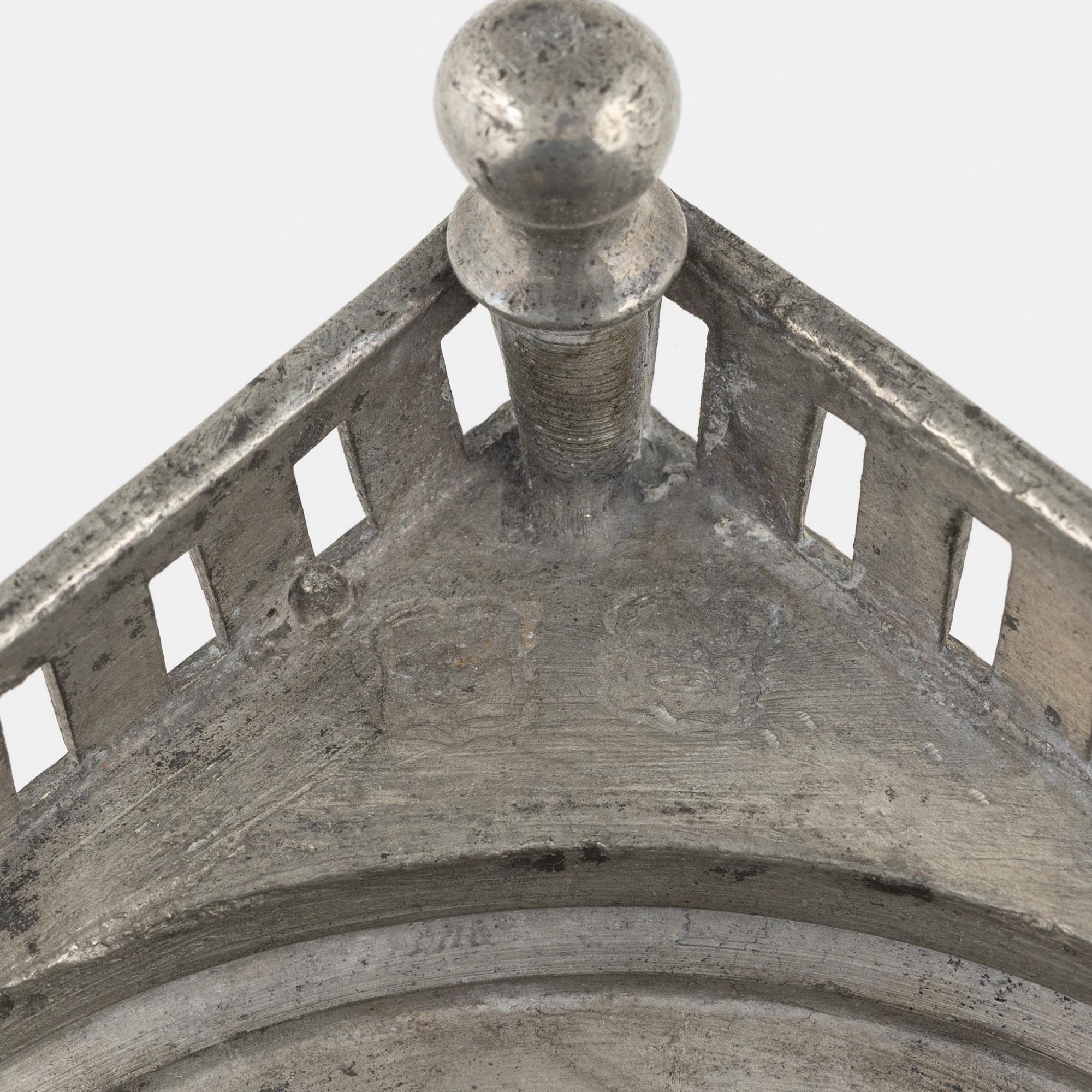 A matched pair of pewter candle sticks, 19th Century.