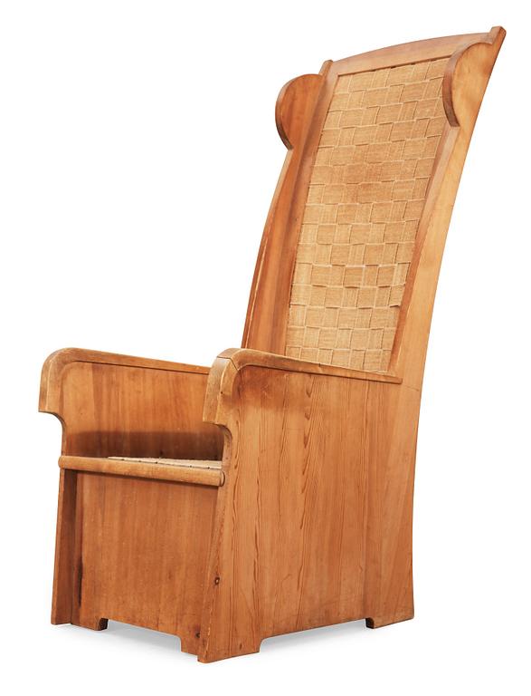 A stained pine armchair attributed to either Axel Einar Hjorth or David Rosén, Nordiska Kompaniet, ca 1932.