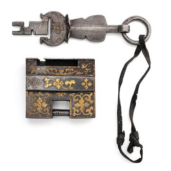 1002. A large iron, silver and gold lock, Tibet, 17th/18th century.