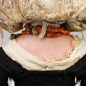 a HEUBACH KÖPPELSDORF porcelain doll, Germany in the first half of the 20th century.