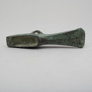 A bronze axe, 1500-500 B.C.