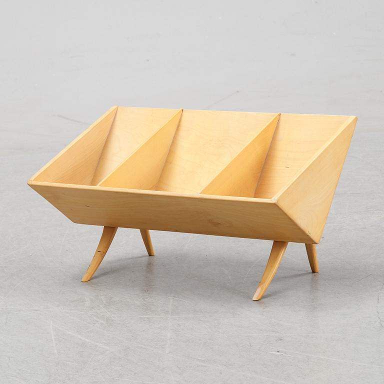 A model T 709 book stand by Bruno Mathsson for Firma Karl Mathsson, dated 1967.