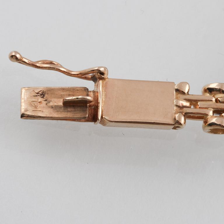 ARMBAND, 18K guld med 10 briljantslipade diamanter ca 2.00 ct. Vikt 11,4 gram.