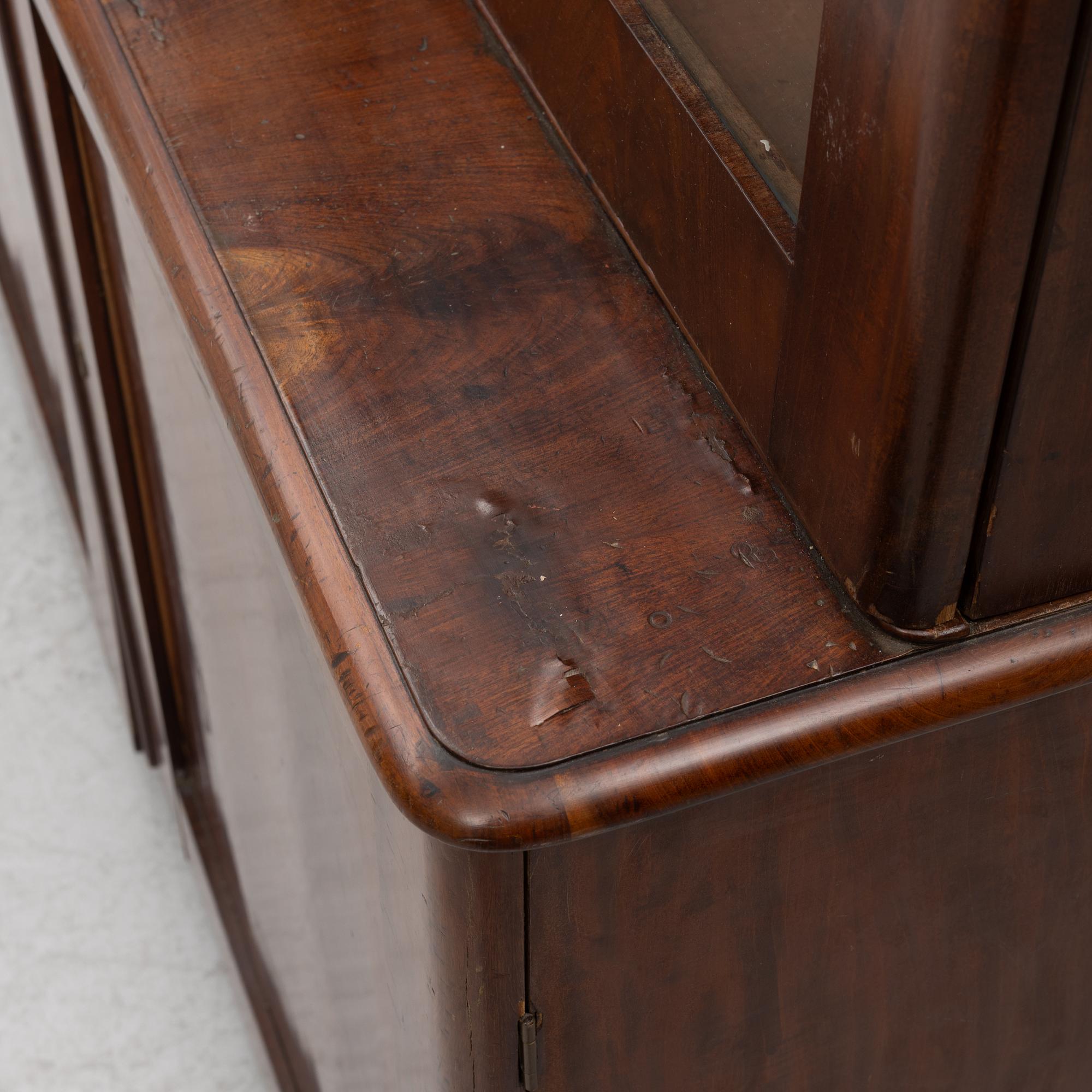 Empire, A late Empire book cabinet, first half of the 19th century.