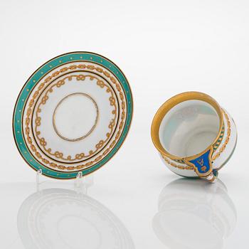 A cup and saucer from the Derzhava service, Imperial Porcelain Manufactory, St. Petersburg, late 19th century.