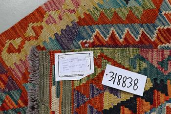 A runner, kilim 397 x 81 cm.