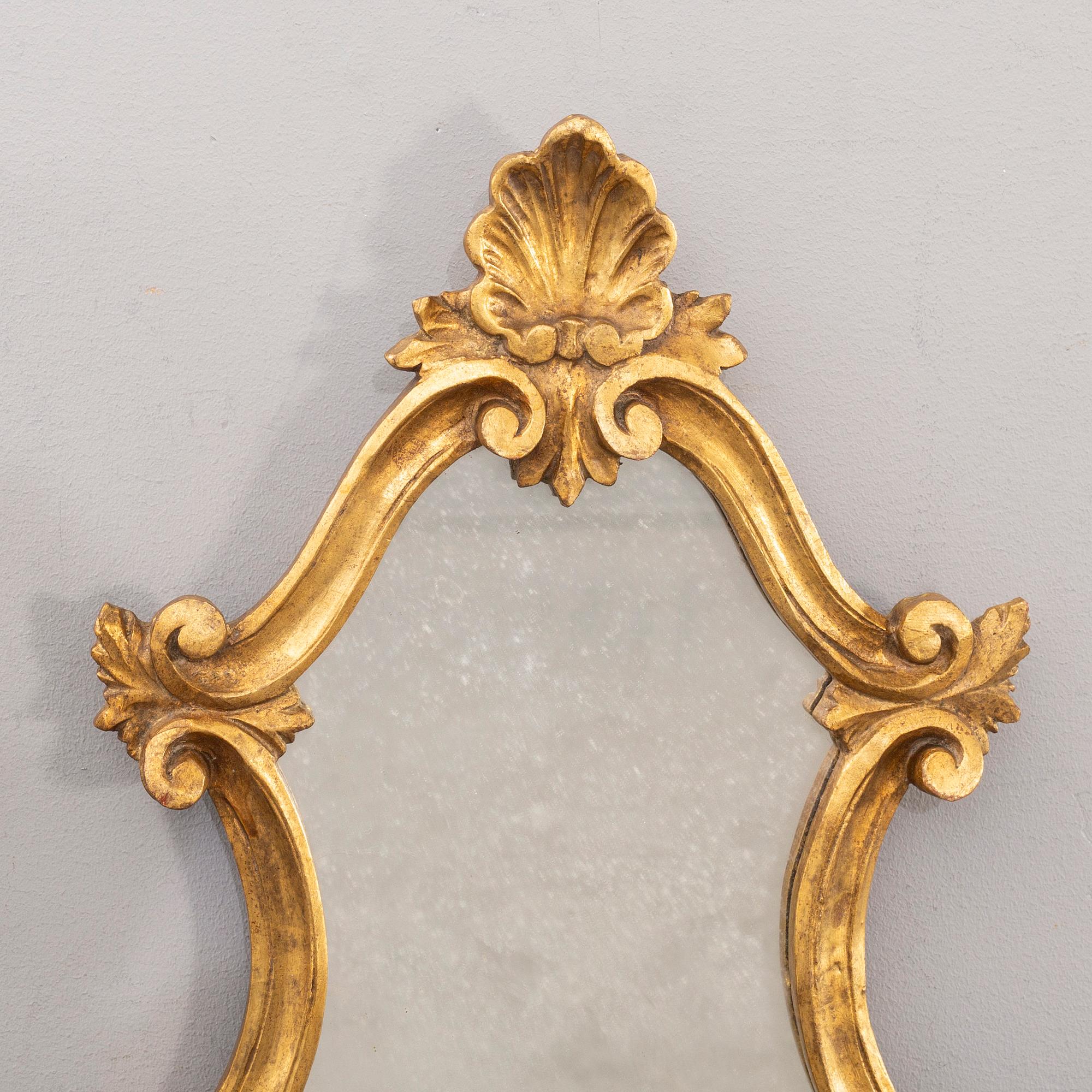 A pair og mid 20th century wood mirrors in LouisXV-style from Paoletti, Firenze italy.