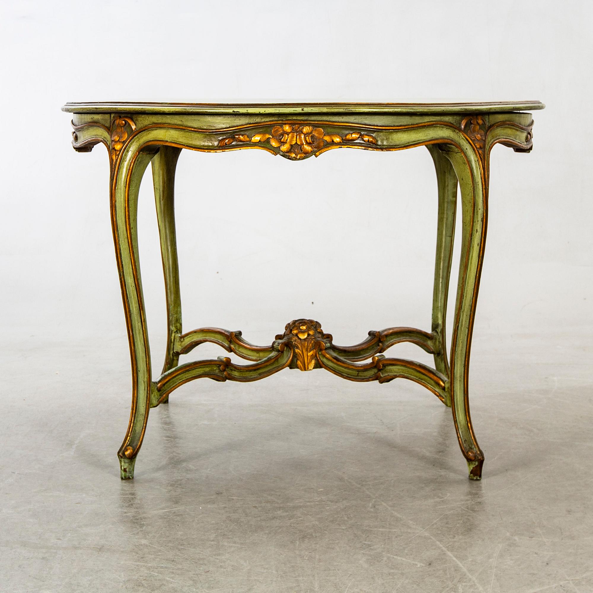 An mid 20th century Louis XV-style table from Paoletti, Firenze Italy.