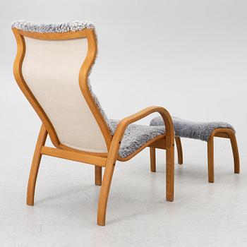 Jan Ekström, armchair with footstool "Gazelle", Conform, 21st century.