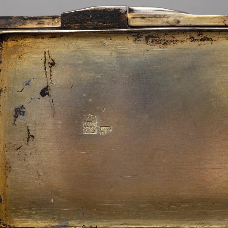 A Russian parcel-gilt silver and niello box, mark of Nicolai Kemper, Moscow 1882.