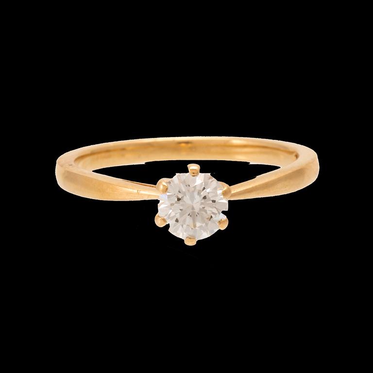 An 18K gold solitaire ring set with a round brilliant-cut diamond with GIA certificate.