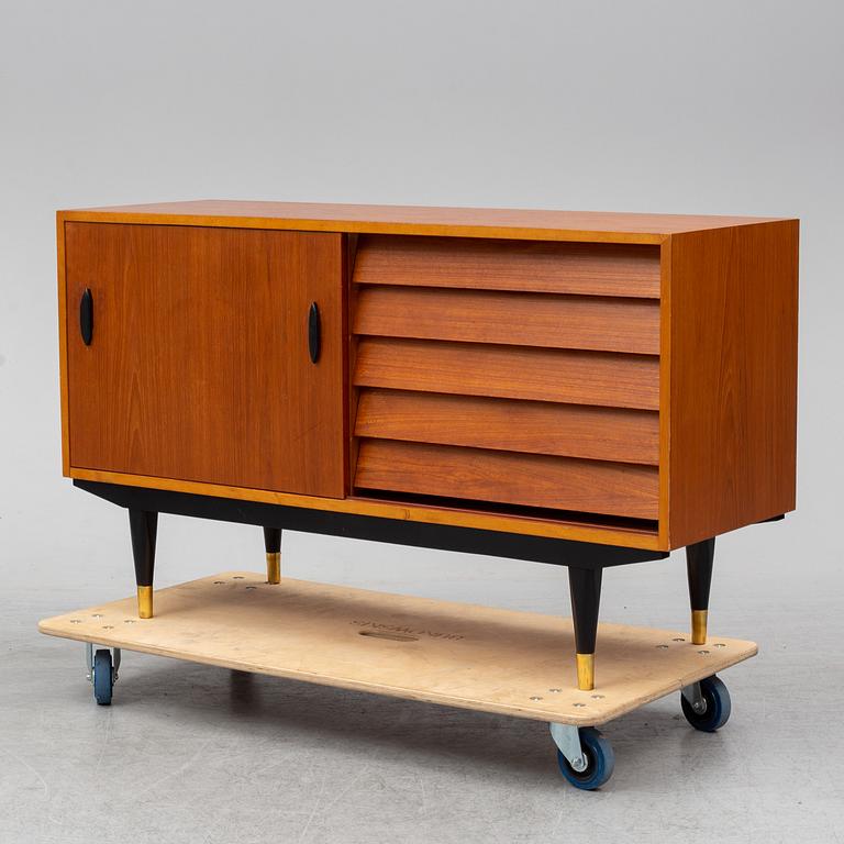 A 'London' teak veneered sideboard by IKEA.