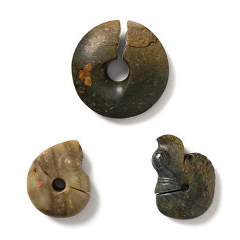 989. A group of three archaistic nephrite 'pig dragon' ornaments.