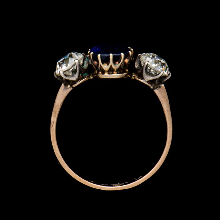 A RING, 14K (56) gold, sapphire, old cut diamonds. Assay mark Ivan Lebedkin, Moscow. Weight c. 2.4 g.