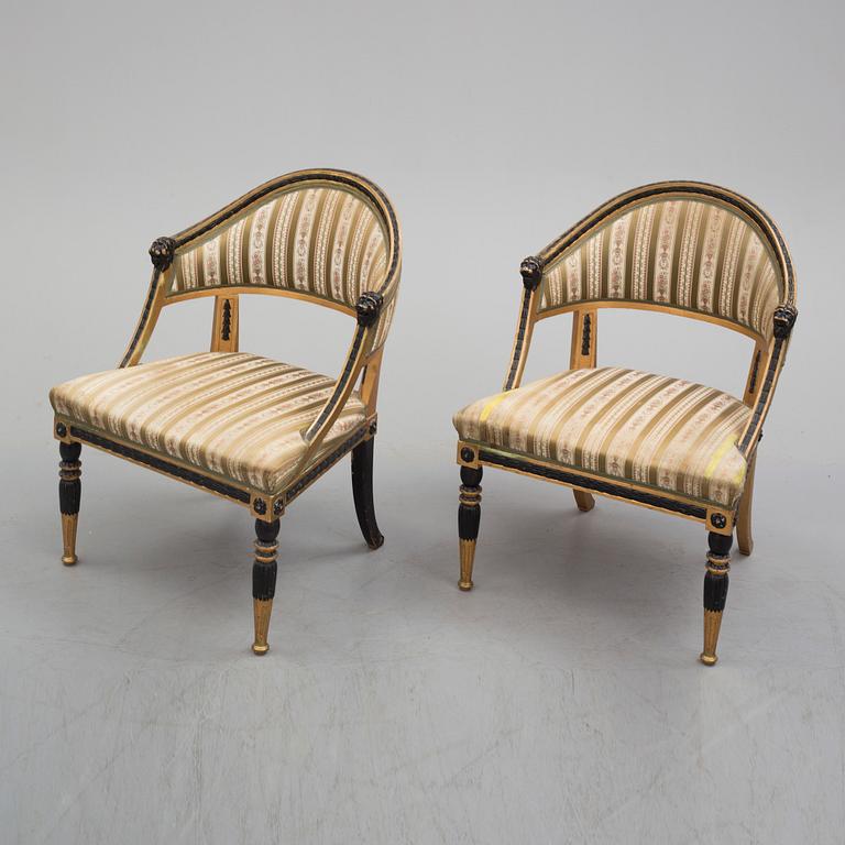 A pair of Gustavian style armchairs.