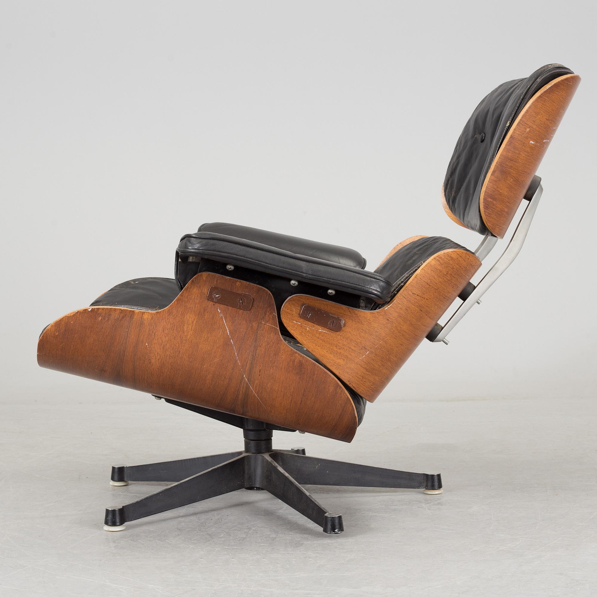 An easy chair and ottoman by Charles & Ray Eames, Herman Miller, USA, produced with licence by Hille, London.
