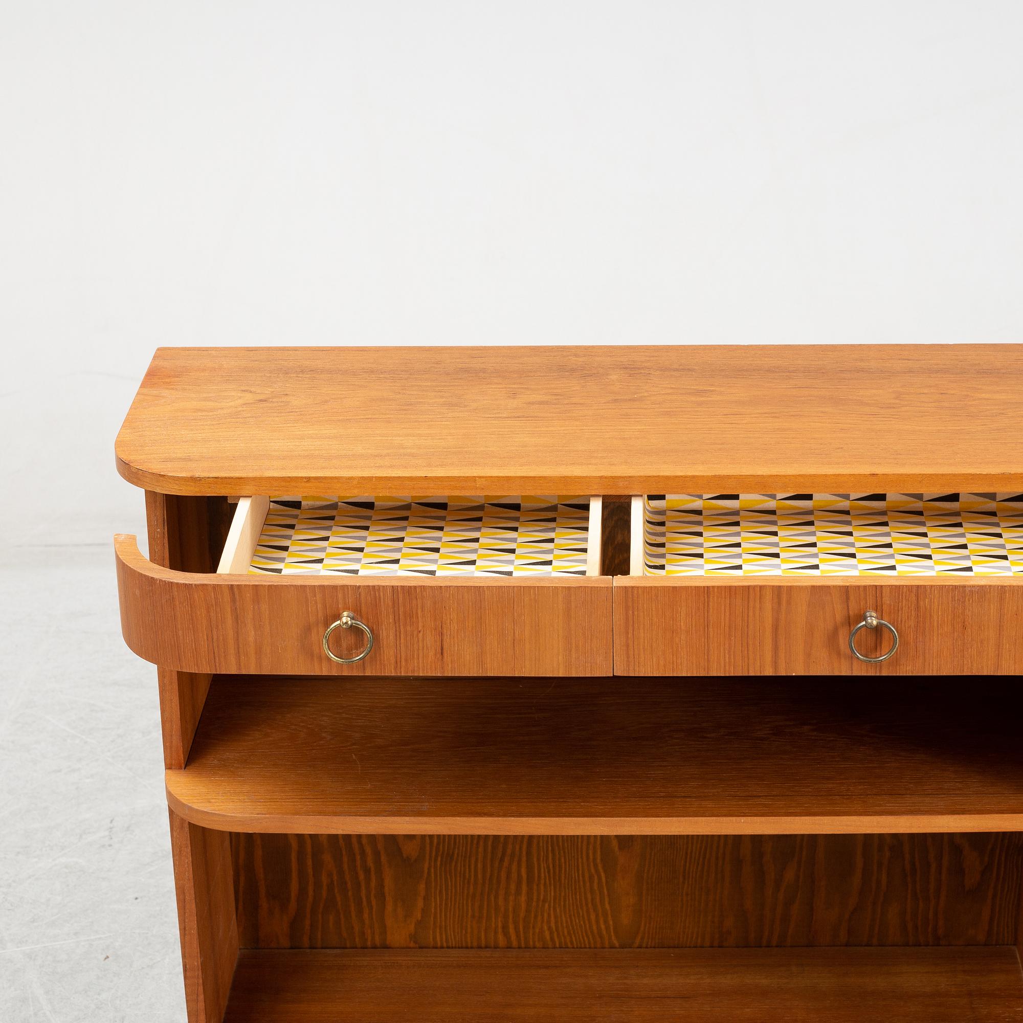 A teak book case. Second half of the 20th Century.