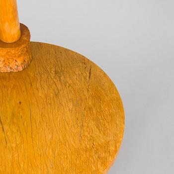 A 1930s burl birch lamp table.