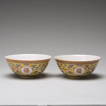 A pair of yellow glazed bowl, Qing dynasty with Guangxu mark in red.