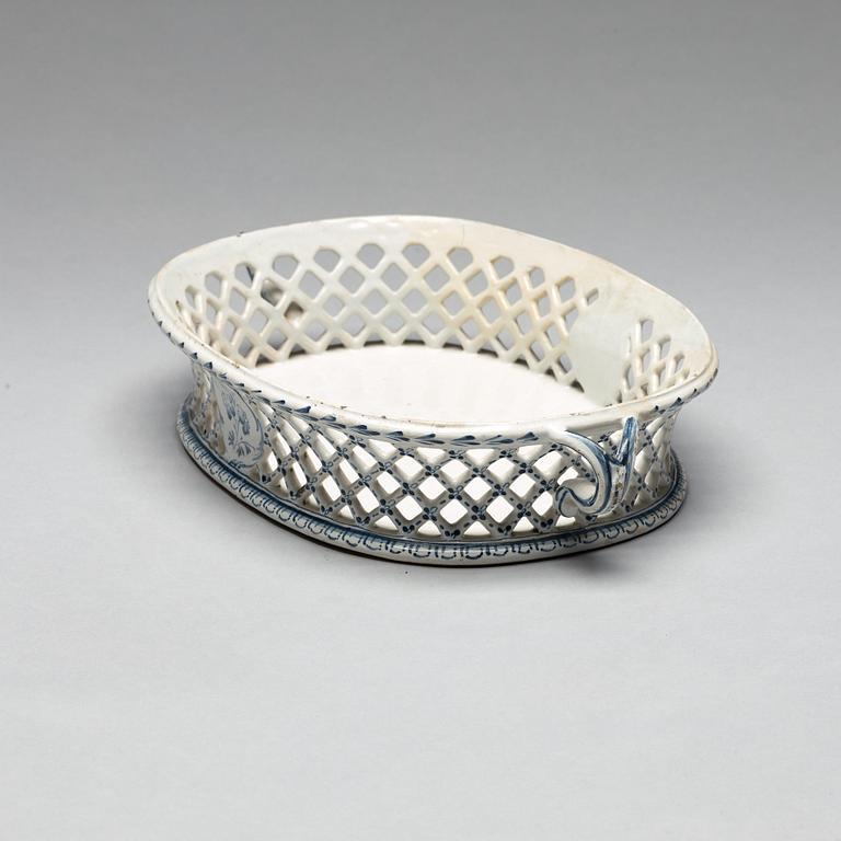 A Swedish faience chestnut basket, Rörstrand, dated 1761.