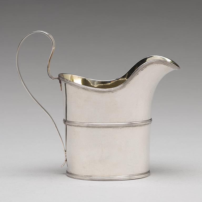 A Swedish early 19th century parcel-gilt silver cream-jug, mark of Nils Limnelius, Stockholm 1810.