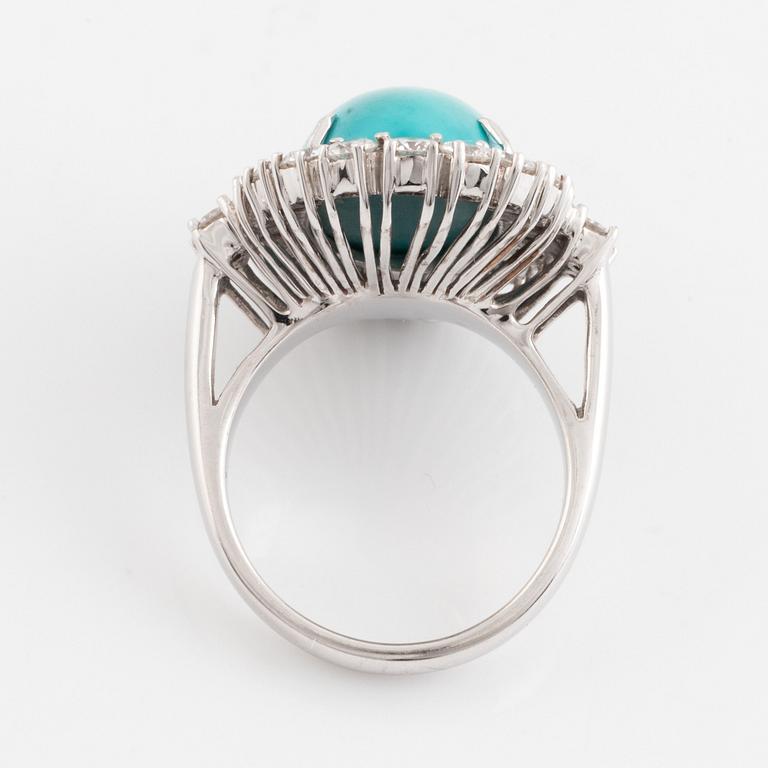 A turquoise and round brilliant cut diamond ring.