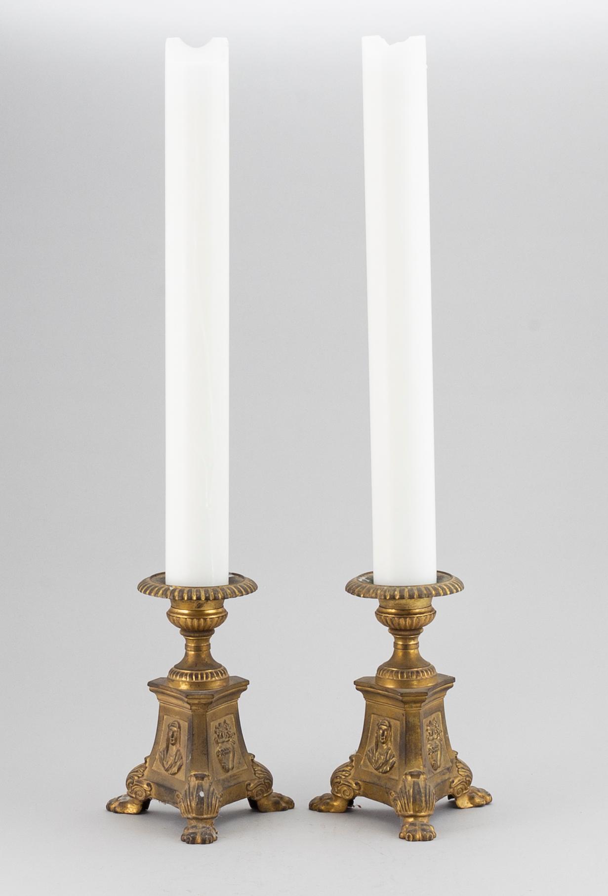 A pair of candlesticks from the 19th century.