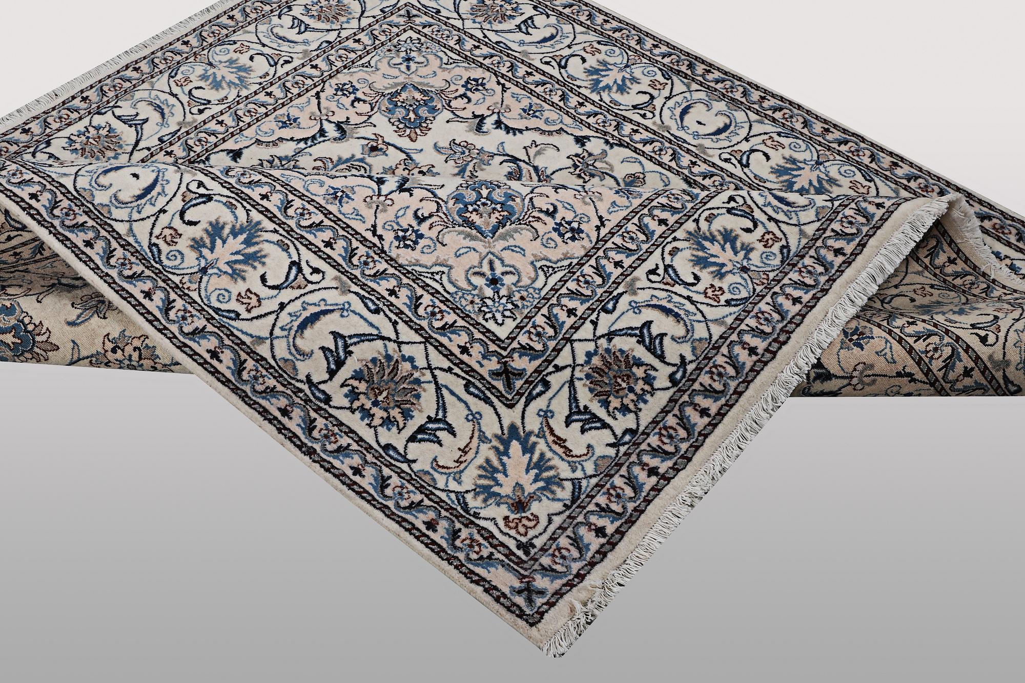 A rug, Nain, part silk, ca 200 x 195 cm.