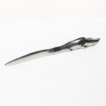 Firma Svenskt Tenn, Candelabrum, 'Vänskapsknuten', and paper knife, 'Alligator'.