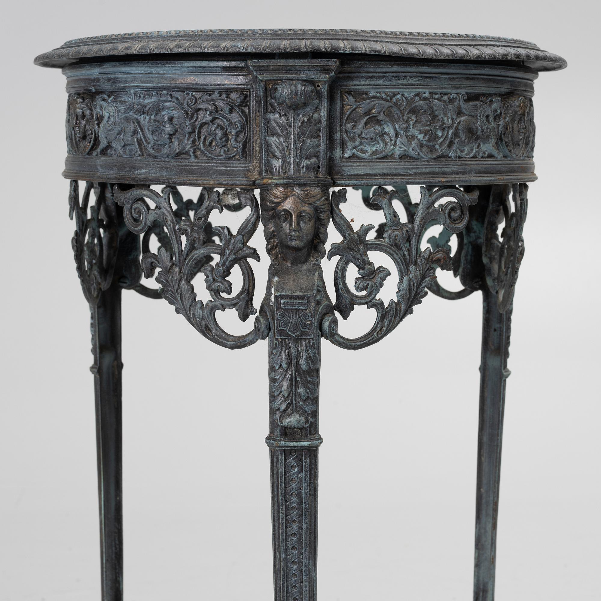 A plant stand, late 20th century.