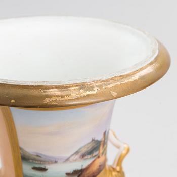 A pair of German porcelain urns from around the mid-19th century.