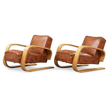 431. Alvar Aalto, a pair of 'tank chairs' model 400, Huonekalu-ja Rakennustyötehdas Oy for Artek, Finland 1940's-50's.