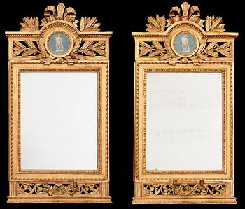 1258. A pair of Gustavian two-light girandole mirrors by Lago Lundén, signed and dated 1789.