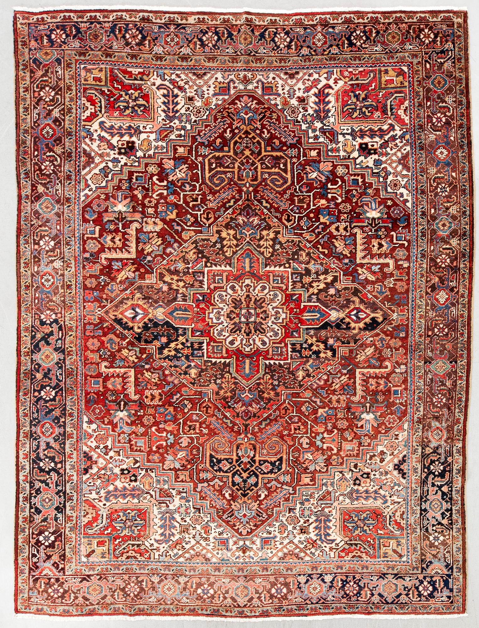 A semi-antique Heriz carpet, North west Persia, c. 366 x 282 cm.
