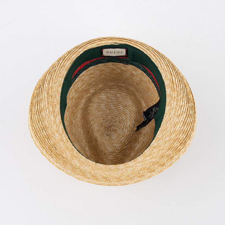 Gucci, a straw hat, size M.