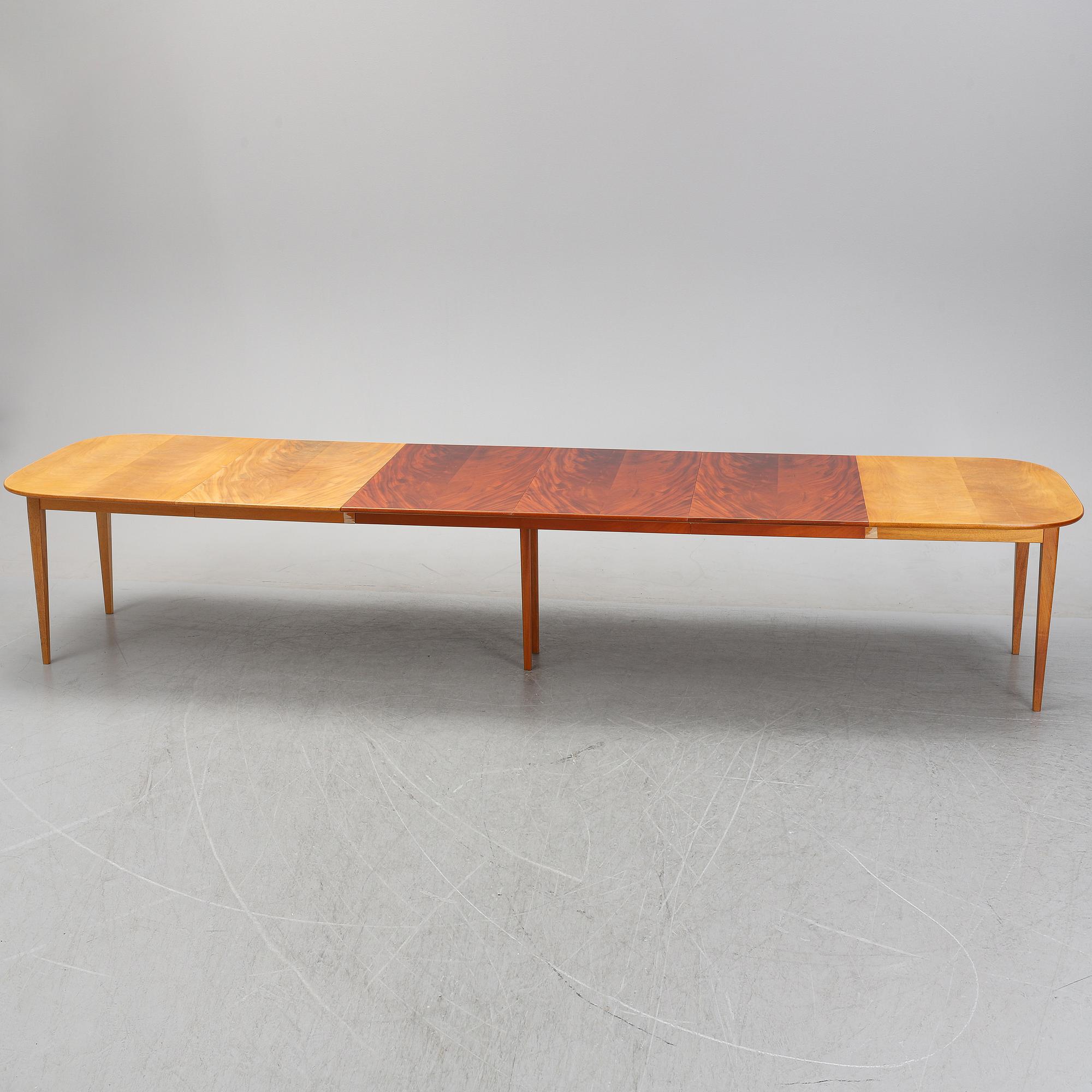 Josef Frank, a model '947' mahogany veneered dinner table for Firma Svenskt Tenn.